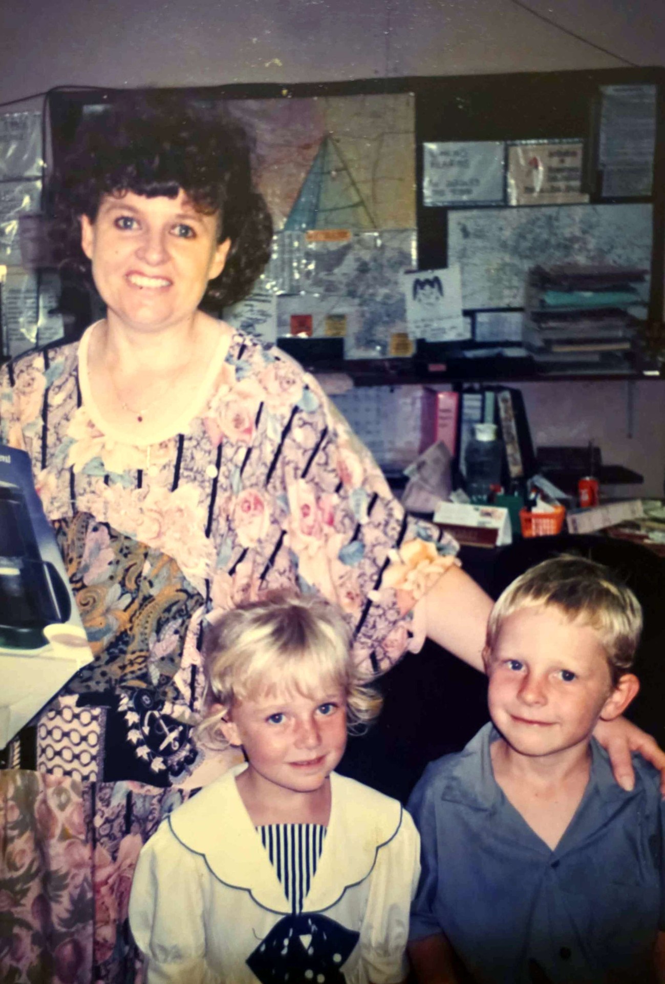 Angelo and his sister as young children with their mum